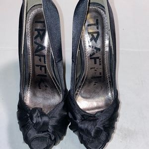 Traffic black satin heels with knot on top, size 9